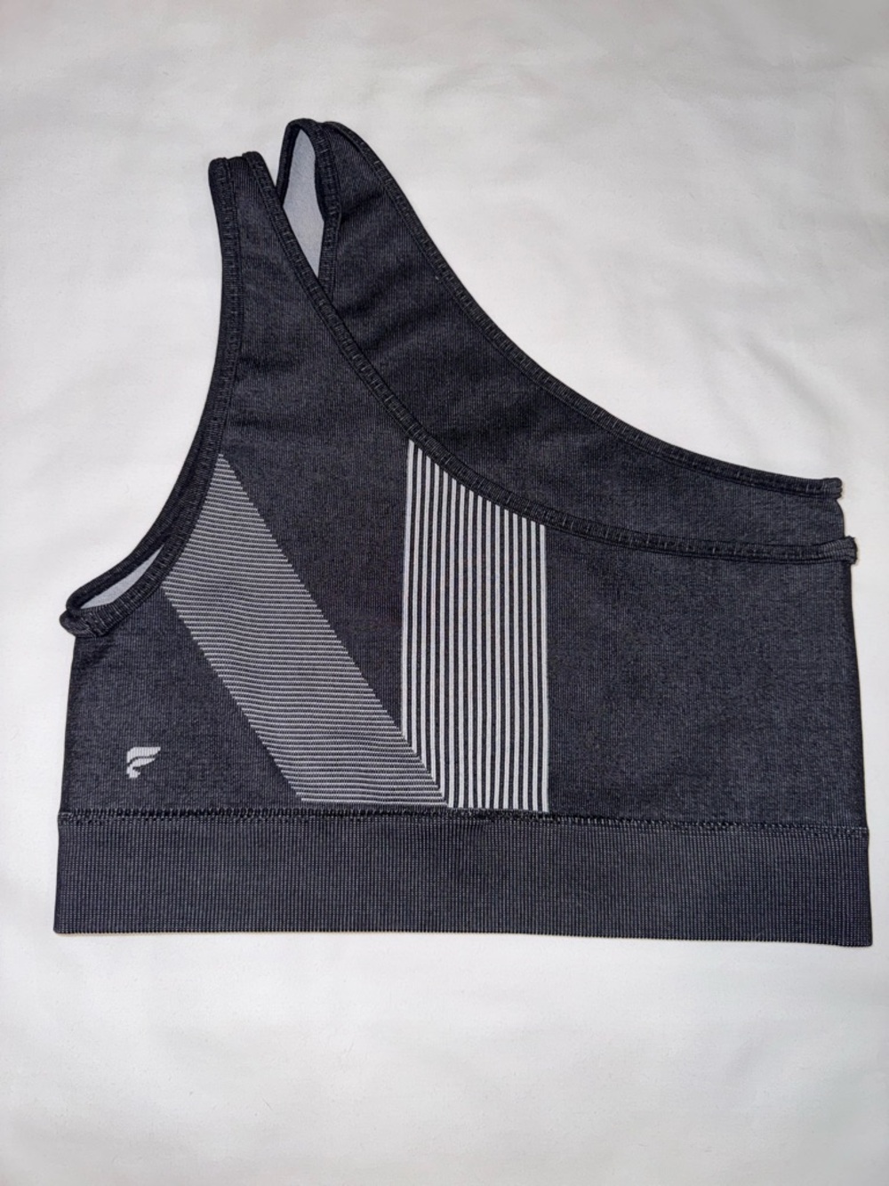 FABLETICS Asymmetric One-Shoulder Sports Bra in Charcoal and Light Gray